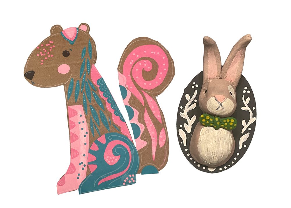 Two whimsical hand-painted kids&rsquo; crafts &mdash; a decorated squirrel and a bunny plaque