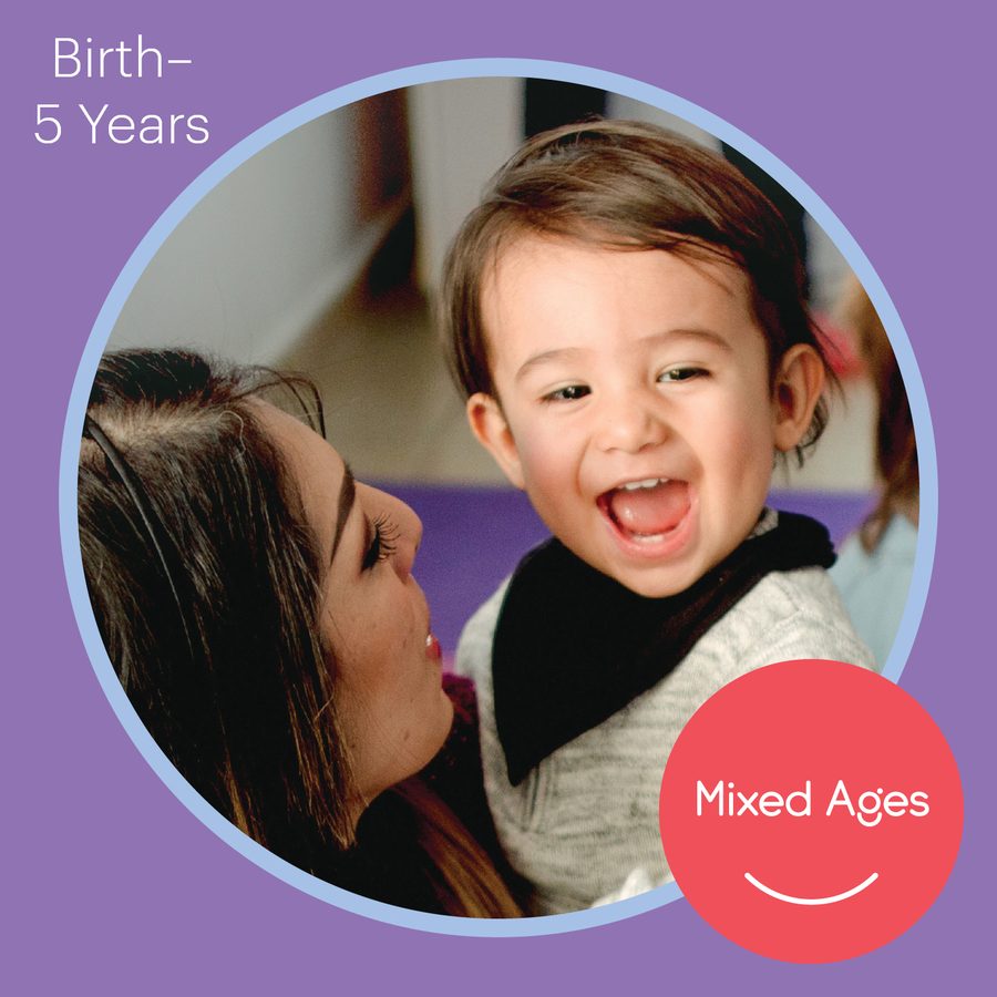 A caregiver and a laughing toddler enjoying an early-childhood music class together